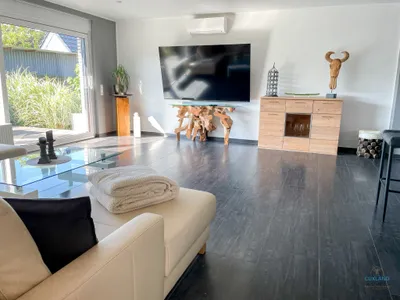 Cuxland-Fewo-Service - Ferienhaus Lindenweg - Wohnzimmer