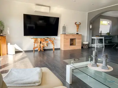Cuxland-Fewo-Service - Ferienhaus Lindenweg - Wohnzimmer
