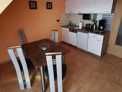 Kochbereich. Küche im Obergeschoss