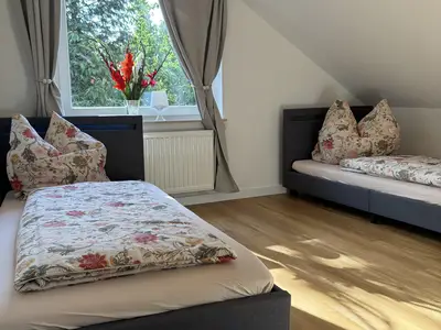 Schlafzimmer mit Einzelbetten