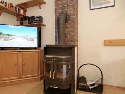 TV und Kamin im Wohnbereich