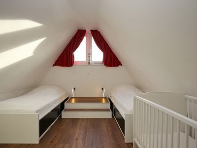 3. Schlafzimmer mit Einzelbetten im Dachgeschoss