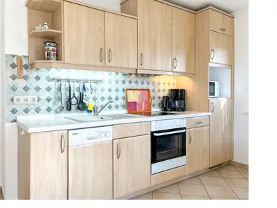 Küchenzeile im Wohnzimmer integriert