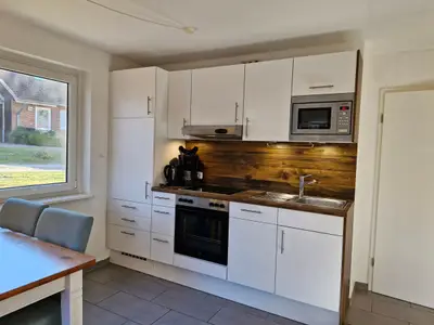 Küchenzeile im Wohnzimmer integriert