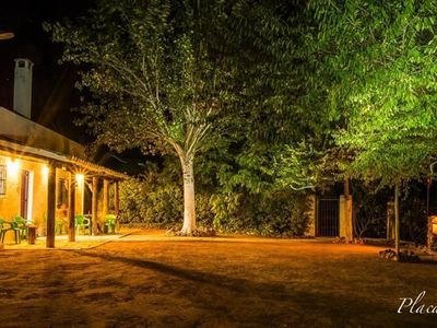 Veranda und Blick auf das Haus am Abend