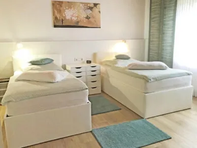 Haus-Wallberg-Schlafzimmer-2-Ansicht2-400x284