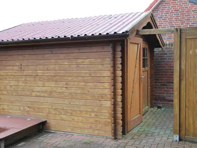 Gartenhaus mit Sandkasten