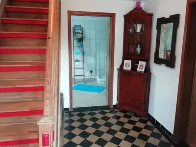 Eingangsbereich mit historischem Steinboden