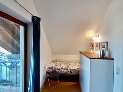 Westschlafzimmer mit Dachterrasse und 2 Betten