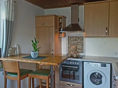 Wohnküche mit Waschmaschine