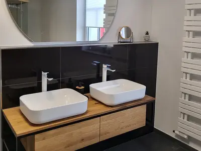 Bad EG mit ebenerdiger Dusche und Sauna