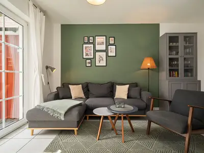Ferienhaus Waldblick am Plauer See mit modernem Wohnzimmer