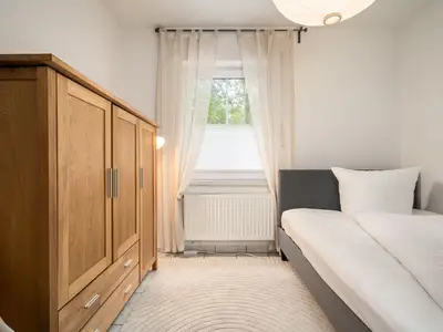 Ferienhaus Zander Fuenfseen Schlafzimmer im Erdgeschoss