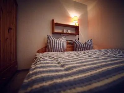 Schlafzimmer 1 mit Doppelbett