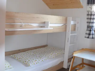 Ferienhaus Sperling Kinderzimmer mit Stockbett