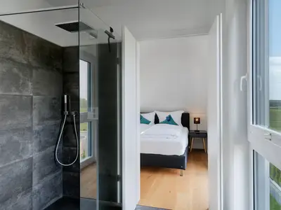Ferienhaus Duncan House Schlafzimmer mit Ensuite-Bad