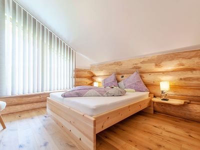 Schlafzimmer im Blockhaus