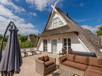 Sitzecke und Sonnenliegen