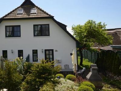 Ferienhaus Seeadler Nr. 29 D
Vorderansicht mit Garten