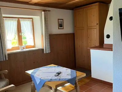 Wohnzimmer mit Schrankbett