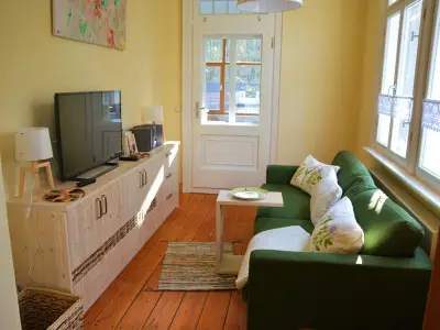 Ferienwohnung Wildkatze - Wohnbereich