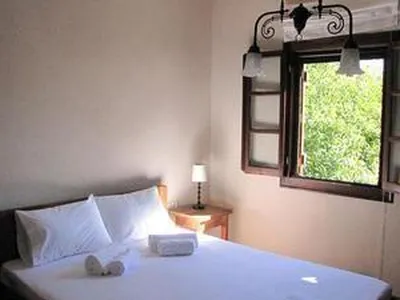 Das Appartement im OG / Schafzimmer mit Doppelbett