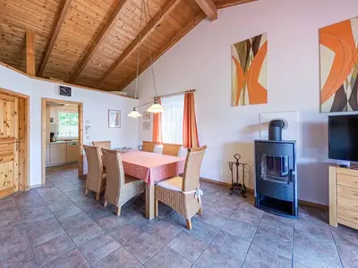 Ferienhaus Himmelblau in Jabel Essbereich mit Kamin