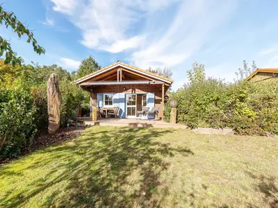 Ferienhaus Blau am See Blick in den Garten