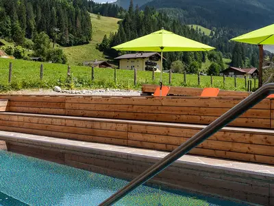 Chalet Large outdoor Pool mit Blick Ennskraxn