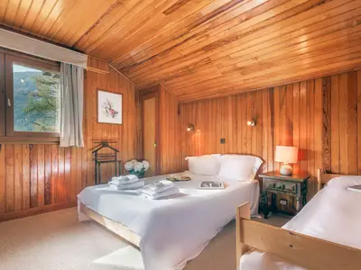 Drittes Schlafzimmer mit Doppelbett und Einzelbett