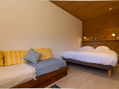 Schlafzimmer 1 mit einem Doppelbett