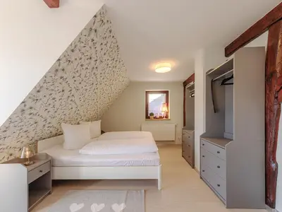Ferienhaus Wasserblick Schlafzimmer mit Doppelbett