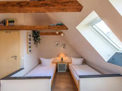 Ferienhaus InselGlück in Malchow Schlafzimmer mit zwei Einzelbetten