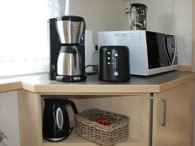 Kochbereich. Küche inkl. Kaffeemaschine, Toaster, Mikrowelle u.v.m.