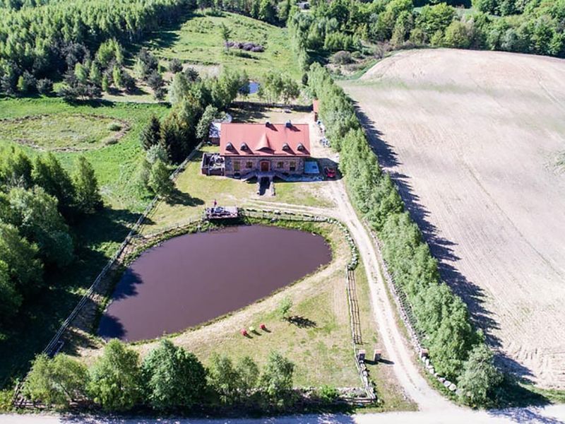 Ferienhaus mit Teich in Szopa (Polen)
