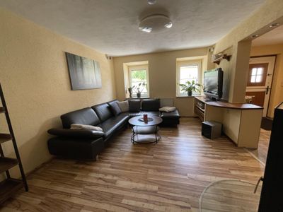 Wohnzimmer_Ferienhaus Mittendrin_Muhl