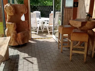 Ferienhaus Mittendrin Neuhütten Muhl Wintergarten.