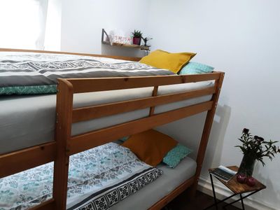 Das Kinderzimmer mit Etagenbett Das Kinderzimmer mit Etagenbett