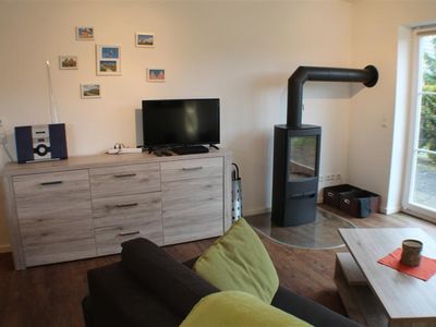 Wohnzimmer mit Kamin