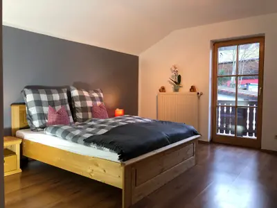 Schlafzimmer mit Balkon