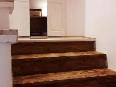 Die schöne Holzstiege in den ersten Stock