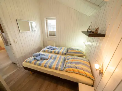 Schlafzimmer mit Doppelbett