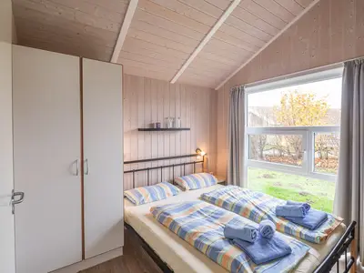 Schlafzimmer mit Doppelbett
