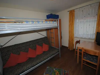 Schlafzimmer mit Hochbett