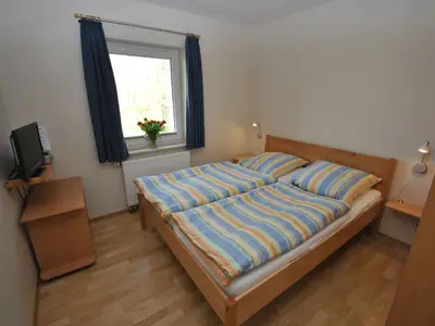 Schlafzimmer mit Doppelbett