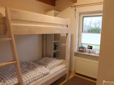 Schlafzimmer mit Hochbett