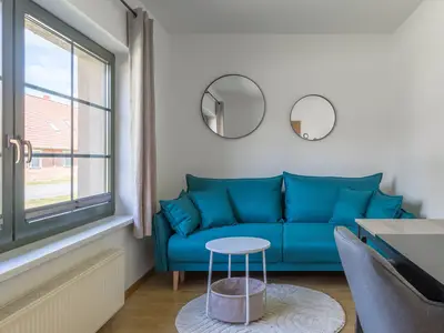 Ferienhaus Wiesenquartier Penkow Wohnbereich mit Schreibtisch