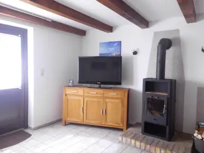 Fernsehecke mit Kamin für die kühleren Tage