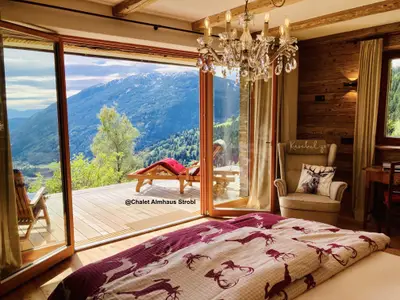 Schlafzimmer & Mirnock@Chalet Almhaus Strobl Nockb
