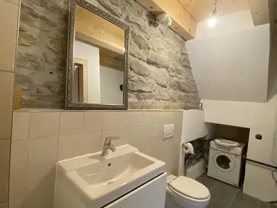 Bad mit einer Waschmaschine 